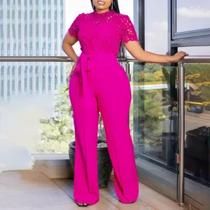 Elegant magenta lace short sleeve jumpsuit featuring wide-leg pants and waist tie detail