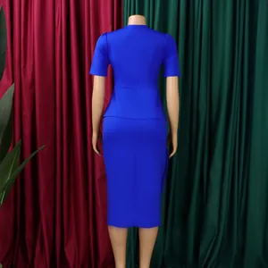 Back view of elegant royal blue two-piece set with short sleeve top and pencil skirt