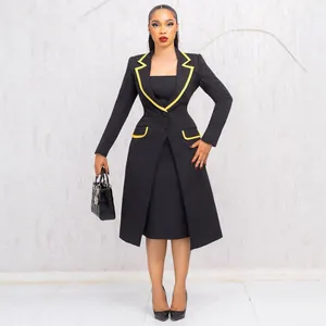 Elegant black two-piece commuting suit set with yellow piping and waist-defining fit.