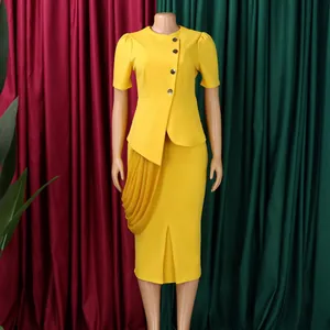 Elegant yellow two-piece African suit with peplum top and slit pencil skirt.