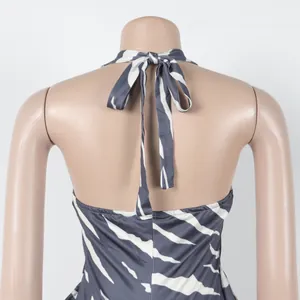 Detailed back view of a sexy zebra print halter jumpsuit showing the elegant tie knot