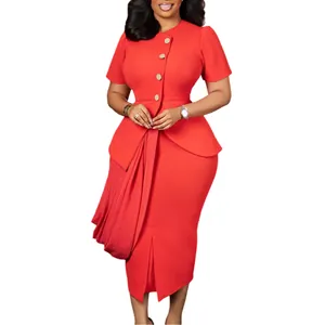 Detail view of an elegant red two-piece set featuring a draped skirt and buttoned top.