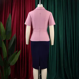 Detailed back view of an elegant pink and navy patchwork sheath dress with short sleeves