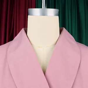 Detailed macro view of an elegant pink shawl collar on a stylish plus size dress