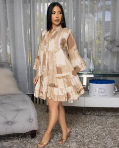 Full-length detail of an elegant loose floral print V-neck mini dress with ruffles