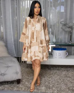 Elegant loose-fitting patchwork print mini dress with V-neckline and ruffled hem