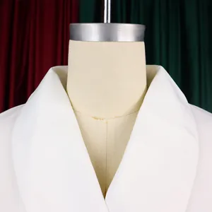 Close-up view of the elegant white shawl collar design on a summer dress detail