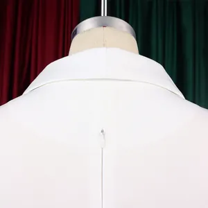 Close-up of the elegant white dress collar and hidden back zipper detail on a mannequin