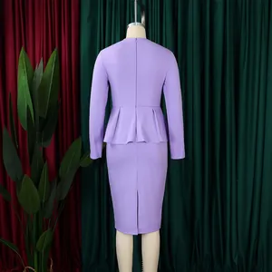 Back view showing the rear details of an elegant purple long-sleeved peplum midi dress