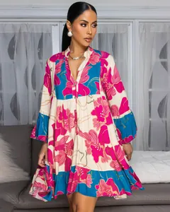 Elegant floral print V-neck loose short dress with contrast color spliced pattern details.