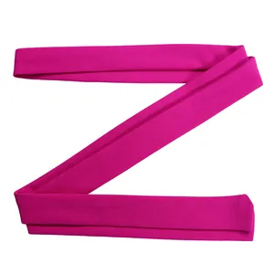 High-quality close-up of a vibrant magenta fabric tie belt showing fine weave texture