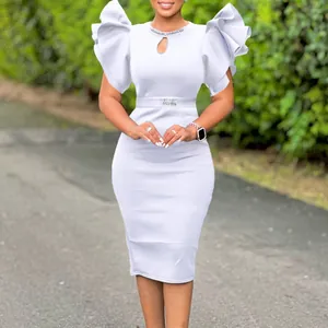 Detailed view of elegant ruffled sleeves and sparkling crystal embellishment on lavender dress