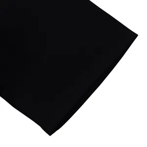 Detailed close-up showing the fine double stitching on black fabric fashion garments