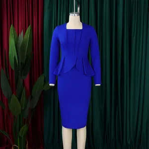 Elegant royal blue peplum midi dress with long sleeves shown on a mannequin display