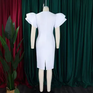 Back view of elegant white bodycon dress with layered ruffle sleeves and hem slit