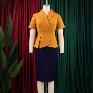 Elegant mustard yellow short-sleeve peplum dress with navy blue pencil skirt on mannequin