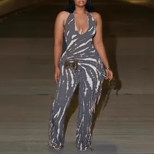 Sexy halter neck backless tie-dye print jumpsuit with side fringe and flared legs
