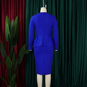 Back view of elegant royal blue peplum midi dress with long sleeves and back slit
