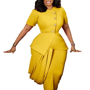 Detailed view of yellow two-piece fashion set featuring peplum top and wrap bodycon skirt