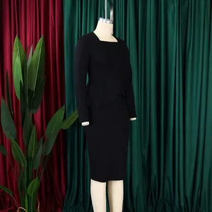 Elegant black long-sleeved OL business dress with peplum waist detail on a mannequin