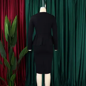 Detailed back view of an elegant black long sleeve peplum dress with a pencil skirt silhouette