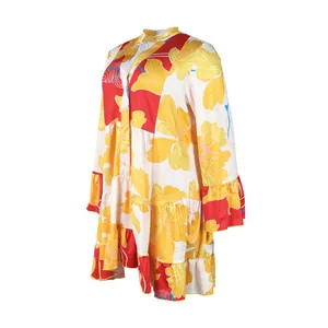 Close-up detail of the elegant floral print V-neck short dress with tiered ruffle hem