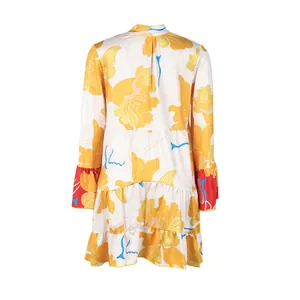 Back view of elegant loose floral print mini dress with contrast red ruffle sleeves