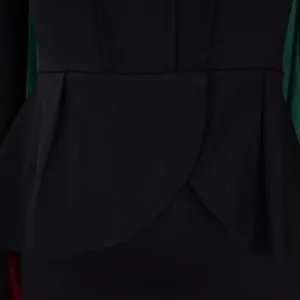Detail view of the elegant peplum waist design on a black long sleeve OL dress.