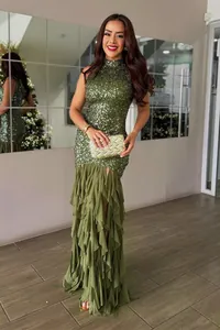 Elegant sequined green mermaid evening dress with multi-layered mesh ruffle skirt details