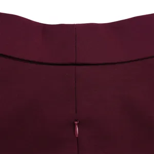 Close-up of invisible back zipper detail on elegant burgundy bodycon dress for women