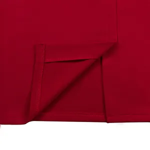 Vista macro dettagliata dell'orlo e delle cuciture di un abito midi rosso elegante da ufficio.