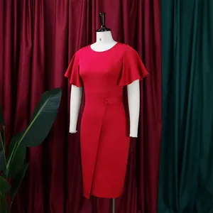 Close-up of elegant red dress with ruffled sleeves and high-waist button detail