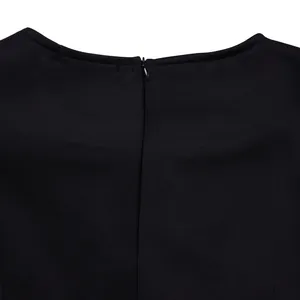 Detailed macro view showing the invisible back zipper and neckline of this black evening dress