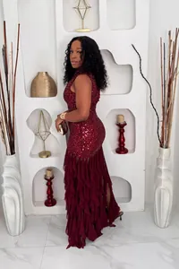Elegant burgundy sequined evening dress featuring detailed tiered mesh ruffles