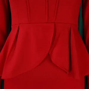 Close-up detail of the elegant red peplum waist and pleated fabric on a long sleeve dress