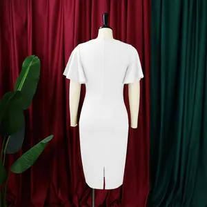 Back view of elegant white ruffle sleeve office dress with high waist and back slit.