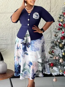 Elegante abito blu scuro con stampa floreale effetto due pezzi per donna