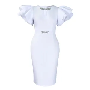 Detail view of a white bodycon dress featuring layered ruffle sleeves and rhinestone decor