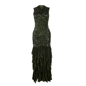 Detailed view of elegant dark green sequin cocktail dress with tiered ruffle mesh skirt
