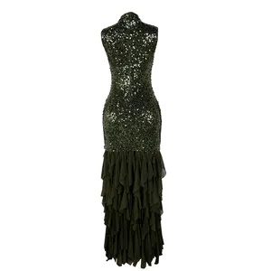 Detail view of elegant dark green sequined evening dress with tiered mesh ruffles.
