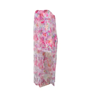 Robe longue bustier sexy en mesh avec imprimé floral abstrait coloré et transparence.