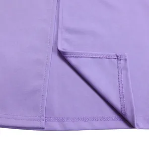 Close-up detail of purple elegant long sleeve dress showing high-quality stitching