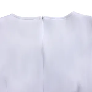 Detailed macro view of white elegant dress featuring round neck and hidden zipper