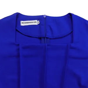Close-up detail of royal blue plus size dress showing square neckline and tag.