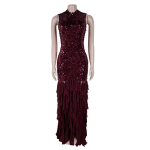 Detailed view of wine red sequined maxi dress with elegant tiered ruffle hem design