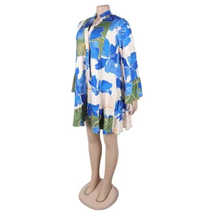 Detailed view of blue floral print V-neck short dress with ruffled bell sleeves