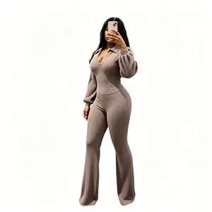 Detail shot of ribbed knit two-piece set with lapel top and flare pants.