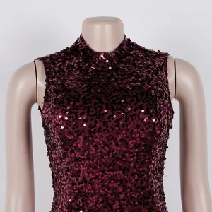 Close-up of elegant wine red sequin mesh patchwork dress showing high collar detail