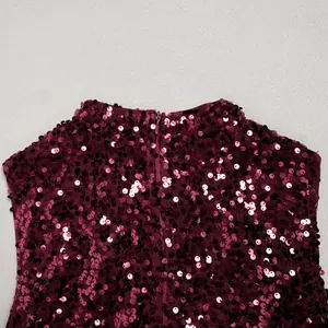 Close-up detail of wine red sequins and invisible back zipper on mesh party dress