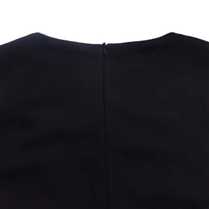 Close-up view showing the back hidden zipper and neckline of black long sleeve dress